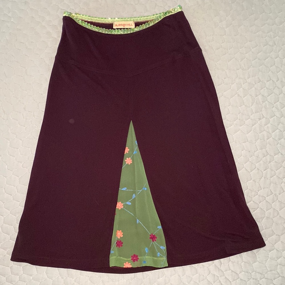 Alanna Hill skirt, size 10. Gorgeous feminine detail at kick front pleat.